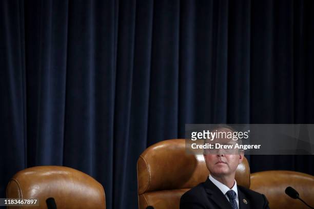 Committee chairman Rep. Adam Schiff listens as former National Security Council Senior Director for European and Russian Affairs Tim Morrison and...