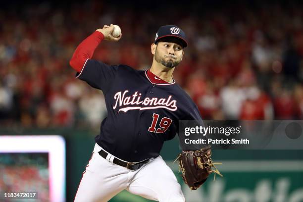 Anibal Sanchez of the Washington Nationals delivers the first pitch of Game Three of the 2019 World Series against the Houston Astros at Nationals...