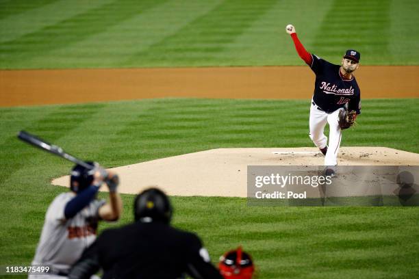 Anibal Sanchez of the Washington Nationals delivers the pitch to Jose Altuve of the Houston Astros during the first inning in Game Three of the 2019...