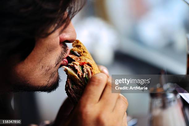 junk food pleasure - mouth stockfoto's en -beelden