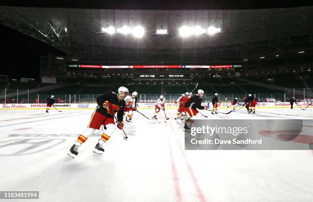 The Calgary Flames take practice prior to the 2019 Tim Hortons NHL Heritage Classic at Mosaic Stadium on October 25, 2019 in Regina, Canada. The...