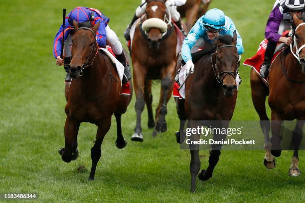 Ben Melham riding La Falaise and Mark Zahra Fascino in a dead heat in race 3 the Fillies Classic during Cox Plate Day at Mooney Valley Racecourse on...