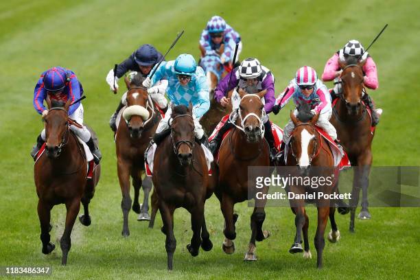 Ben Melham riding La Falaise and Mark Zahra Fascino in a dead heat in race 3 the Fillies Classic during Cox Plate Day at Mooney Valley Racecourse on...