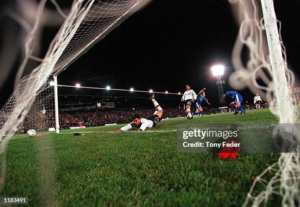 John Anastasiadis of South Melbourne gets the ball past Robert Trajkovski of Carlton to score the first goal of the match, during the National Soccer...