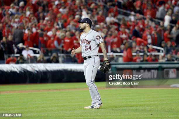 Roberto Osuna of the Houston Astros celebrates his teams 4-1 win over the Washington Nationals in Game Three of the 2019 World Series at Nationals...