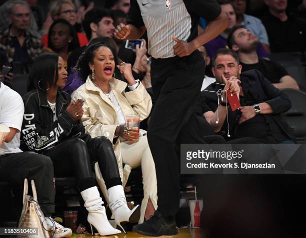 Melissa Forde, Rihanna and Brett Ratner attend a basketball game between the Los Angeles Lakers and the Utah Jazz at the at Staples Center on October...