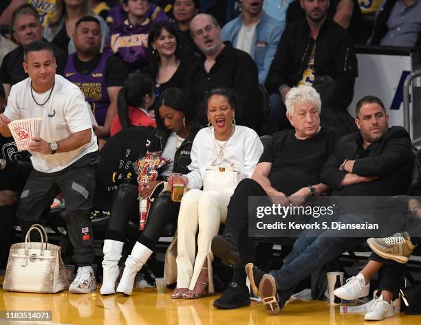 Melissa Forde, Rihanna and Brett Ratner attend a basketball game between the Los Angeles Lakers and the Utah Jazz at the at Staples Center on October...