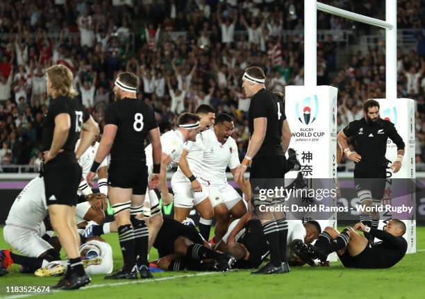 Manu Tuilagi of England scores a try during the Rugby World Cup 2019 Semi-Final match between England and New Zealand at International Stadium...