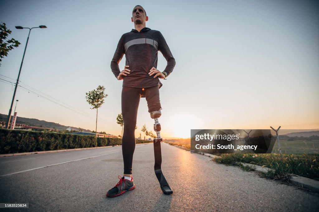 Sports man with prosthetic leg