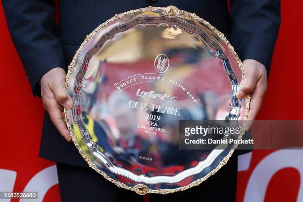 Hiroaki Akita holds the Cox Plate after winning race 9 the the Ladbrokes Cox Plate during Cox Plate Day at Mooney Valley Racecourse on October 26,...