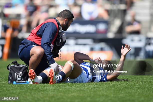 Joanna Fanene of Auckland receives medical help during the Farah Palmer Cup Final between Canterbury and Auckland at Rugby Park on October 26, 2019...