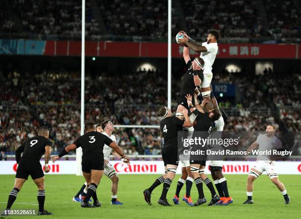Courtney Lawes of England and Kieran Read of New Zealand compete for a lineout during the Rugby World Cup 2019 Semi-Final match between England and...