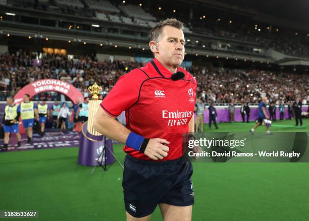 Match Referee Nigel Owens runs out prior to the Rugby World Cup 2019 Semi-Final match between England and New Zealand at International Stadium...