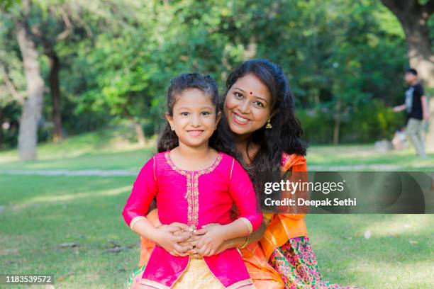 spending time with mother stock photo - indian mother daughter stock pictures, royalty-free photos & images