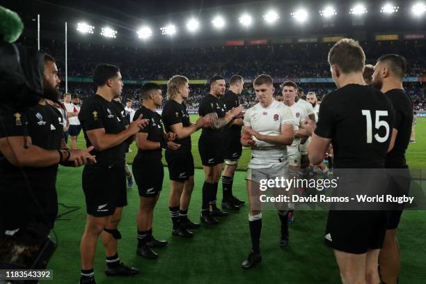 New Zealand players applaud as Owen Farrell of England leads his te during the Rugby World Cup 2019 Semi-Final match between England and New Zealand...