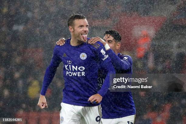 Jamie Vardy of Leicester City celebrates after scoring his team's fifth goal with Ayoze Perez of Leicester City during the Premier League match...