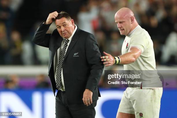 England player Dan Cole consoles New Zealand coach Steve Hansen after the Rugby World Cup 2019 Semi-Final match between England and New Zealand at...