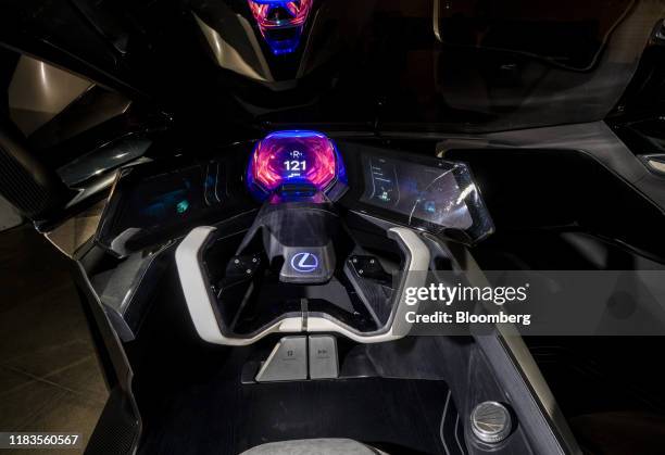 The steering wheel and dashboard of a Toyota Motor Corp. Lexus LF-30 Electrified Concept vehicle are seen during a reveal event ahead of the Los...