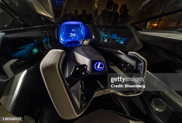 The steering wheel and dashboard of a Toyota Motor Corp. Lexus LF-30 Electrified Concept vehicle are seen during a reveal event ahead of the Los...