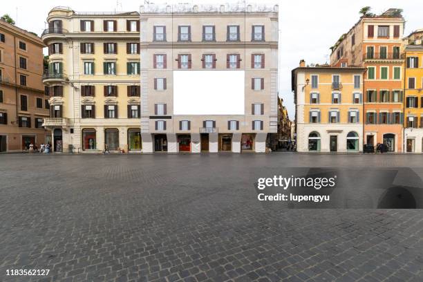 blank billboard on building facade in piazza di spagna,rome - commercial sign fotografías e imágenes de stock