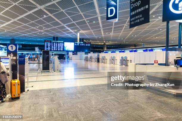 empty airport terminal. - japan gate stock pictures, royalty-free photos & images