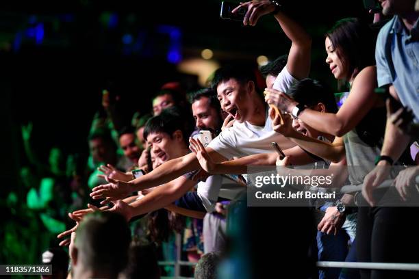 Fans cheer during the UFC Fight Night event at Singapore Indoor Stadium on October 26, 2019 in Singapore.