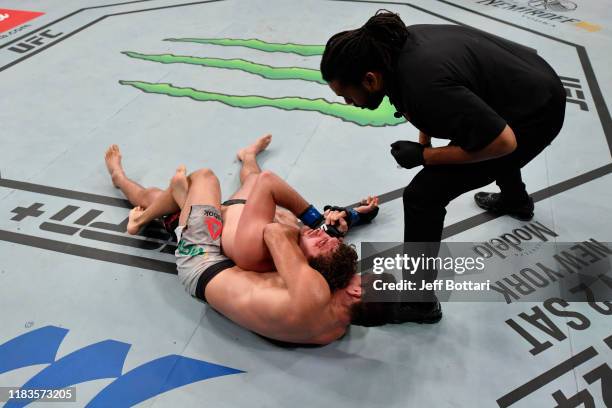 Ben Askren submits Ben Askren in their welterweight bout during the UFC Fight Night event at Singapore Indoor Stadium on October 26, 2019 in...