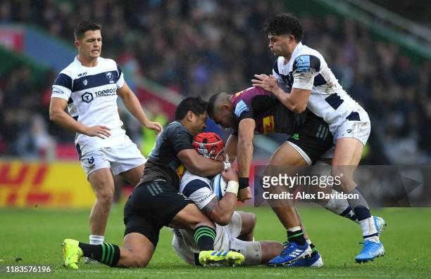 Siale Piutau of Bristol Bears is tackled by Joe Marchant and Ben Tapuai of Harlequins during the Gallagher Premiership Rugby match between Harlequins...
