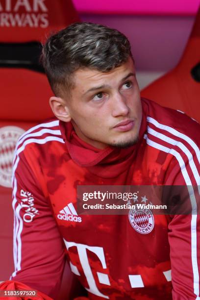 Michael Cuisance of Bayern Munich sits on the bench prior to the Bundesliga match between FC Bayern Muenchen and 1. FC Union Berlin at Allianz Arena...
