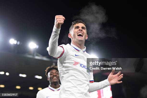 Christian Pulisic of Chelsea celebrates with teammates after scoring his team's third goal during the Premier League match between Burnley FC and...