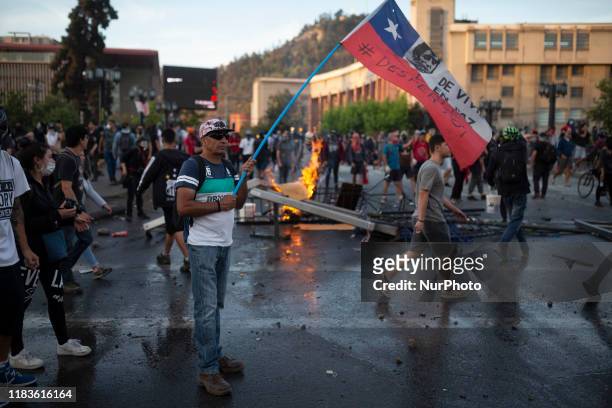 Demonstrators clash with security forces during protests against Chile's government in Santiago, Chile October 30,2019.