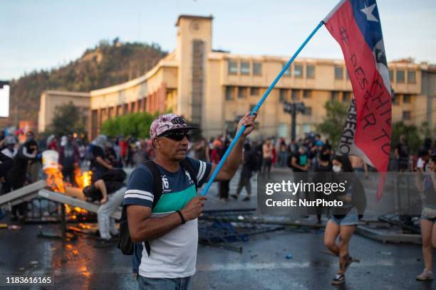 Demonstrators clash with security forces during protests against Chile's government in Santiago, Chile October 30,2019.