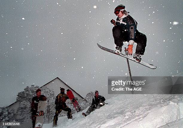 Snowboarders at Falls Creek enjoy the season opening weekend's best snow falls in 20 years, 14 June 1999.