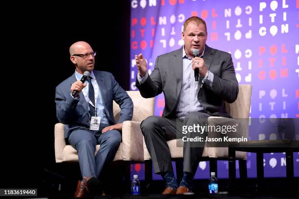 Dr. Jonathan Metzl and Mayor Glenn Jacobs speak onstage during the 2019 Politicon at Music City Center on October 26, 2019 in Nashville, Tennessee.