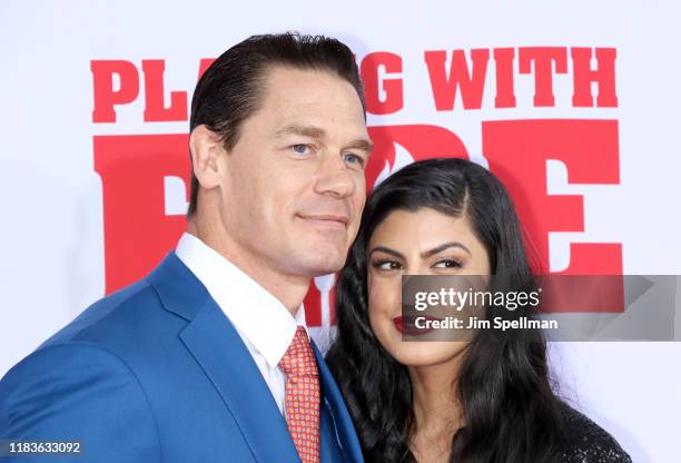 Actor/wrestler John Cena and Shay Shariatzadeh attend the "Playing With Fire" New York premiere at AMC Lincoln Square Theater on October 26, 2019 in...