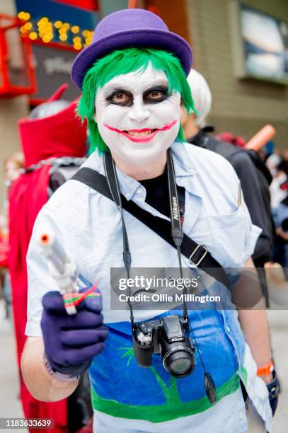 Cosplayer in character as The Joker from Batman during day 2 of the October MCM London Comic Con 2019 at ExCel on October 26, 2019 in London, England.