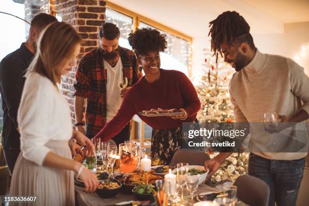 preparing table for new year dinner - christmas alcohol drink stock pictures, royalty-free photos & images