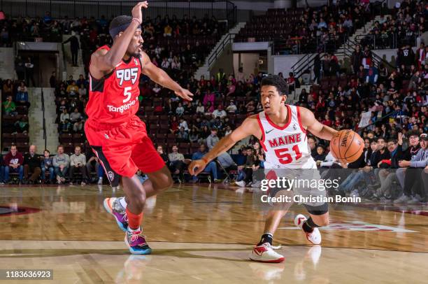 Tremont Waters of the Maine Red Claws dribbles the ball against Paul Watson Junior of the Mississauga Raptors 905 defends on November 20, 2019 at The...