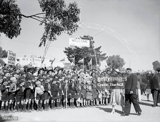 Queen Elizabeth greets young Boy Scouts and Girl Guides in the town of Rochester, Victoria, 4 March 1954. She was visiting country towns as part of...