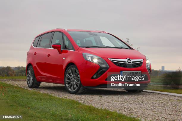 opel zafira minivan on the road - opel stock pictures, royalty-free photos & images