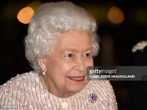 Britain's Queen Elizabeth II arrives at Chatham House in central London on November 20 to present the 2019 Chatham House Prize to British broadcaster...