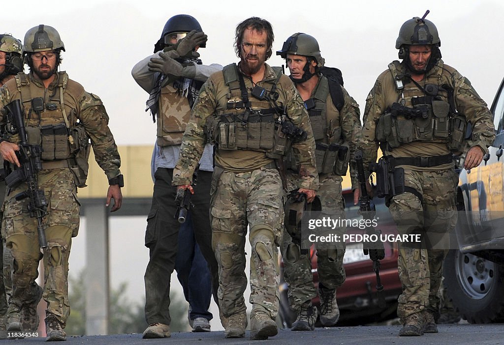 Foreign soldiers leave after taking part