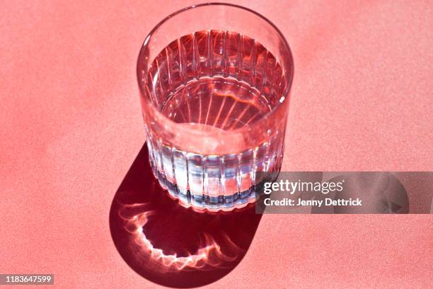 glass of water - drinking glass foto e immagini stock