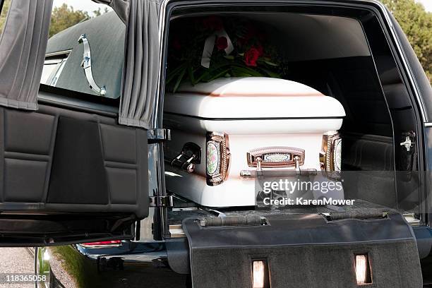 casket in hearse - hearse stockfoto's en -beelden