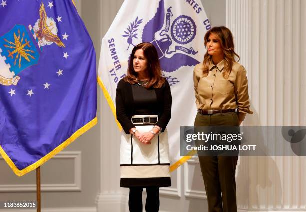Second Lady Karen Pence and First Lady Melania Trump attend a Red Cross event to assemble comfort kits for troops deployed overseas, at the American...