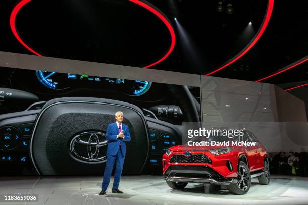 Toyota Motor North America Vice President and General Manager shows the Toyota RAV4 Hybrid at AutoMobility LA on November 20, 2019 in Los Angeles,...