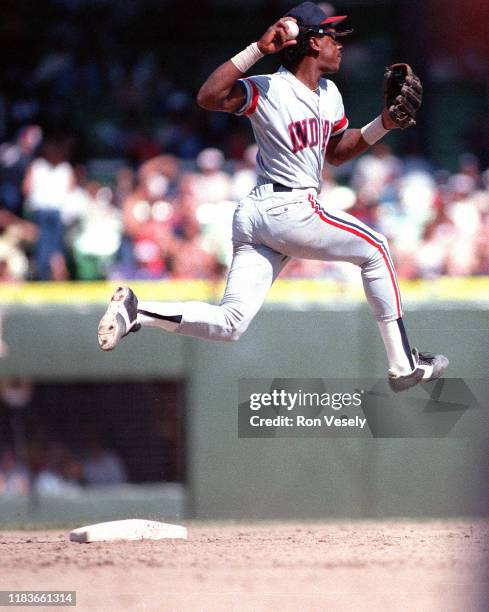 Julio Franco of the Cleveland Indians throws during a MLB game at Comiskey Park in Chicago, Illinois. Franco played for the Cleveland Indians from...