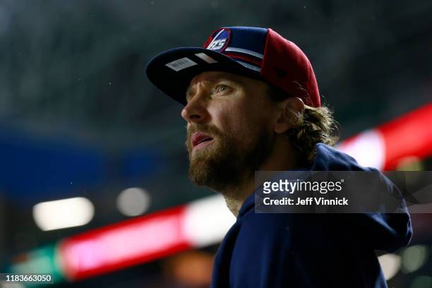 Blake Wheeler of the Winnipeg Jets looks on from the field prior to playing in the 2019 Tim Hortons NHL Heritage Classic against the Calgary Flames...