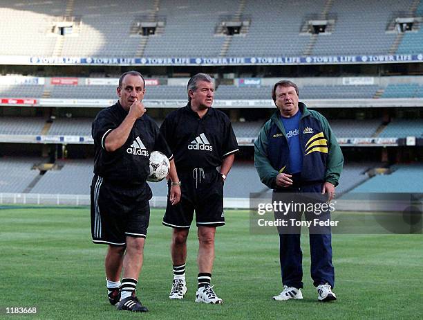 Socceroo coach Terry Venables, flanked by assistant coaches Raul Blanco and Les Sceinflug, watch over training at the MCG in preperation for the 2nd...