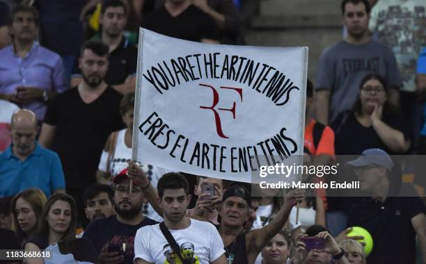 Fan of Roger Federer of Switzerland shows a sign in stands during an exhibition game between Alexander Zverev and Roger Federer at Arena Parque Roca...